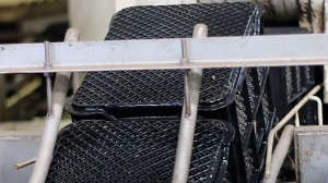 松山産業のコンテナ洗浄機